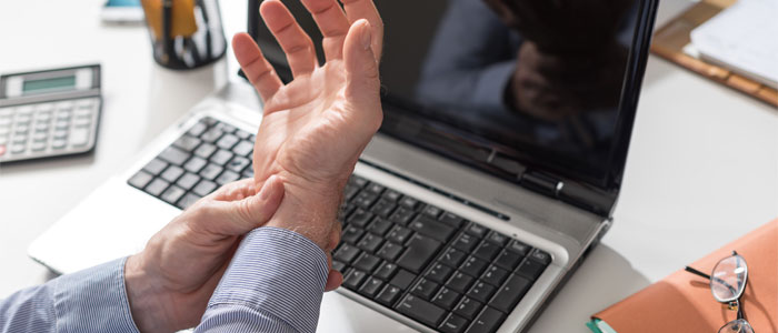 a man holding his own wrist